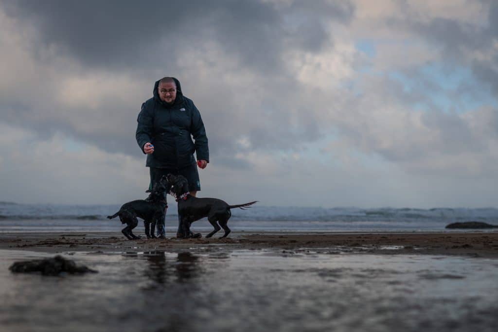 Dog and owner at Watergate bay photography