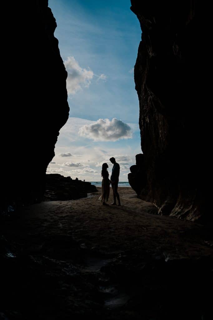 Silhouette of newly engaged couple at Perranporth beach