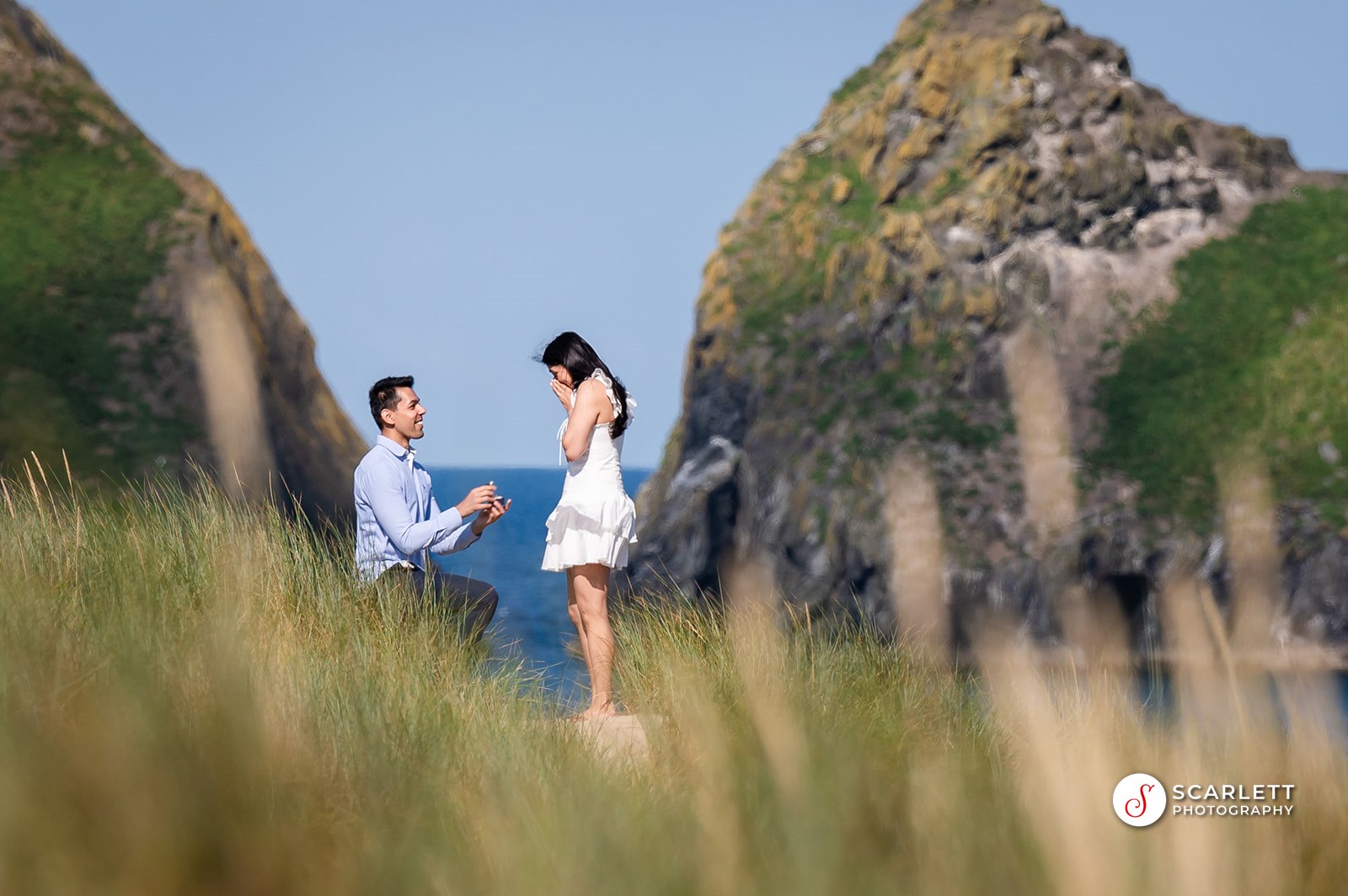 Couple propose at Holywell bay, Cornwall in the glorious sunshine